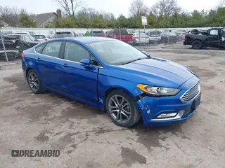 2017 Ford Fusion SE z VIN 3FA6P0H7XHR372552, wystawiony jako IAAI lot #41961909 z przebiegiem 139 199 mil mil oraz . Historia ofert i sprzedaży dostępna na DreamBid. Obrazek 13.