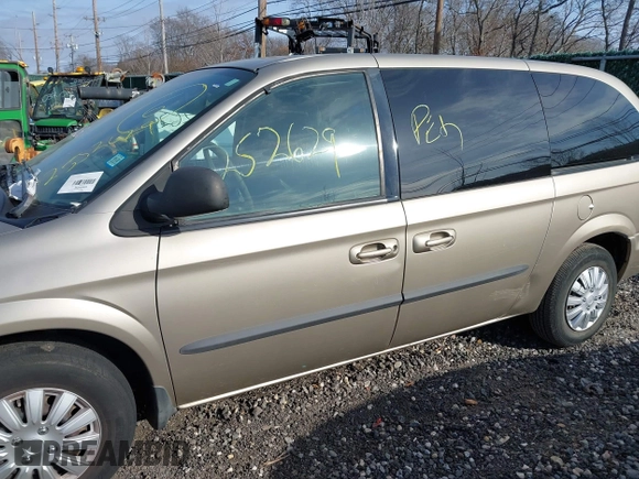 2003 Dodge Caravan Sport with VIN 2D4GP44R13R274458, listed as a IAAI auction lot 41788865 with 999,999 mi miles. Bid and sale history available at carsss.com. Image 6.