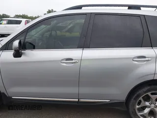 2015 Subaru Forester Touring with VIN JF2SJAUC8FH467730, listed as a IAAI auction lot 42403195 with 142,287 mi miles and . Bid and sale history available at DreamBid. Image 14.