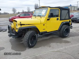 2000 Jeep Wrangler SE with VIN 1J4FA29P2YP797156, listed as a IAAI auction lot 41517183 with 114,236 mi miles. Bid and sale history available at carsss.com. Image 19.