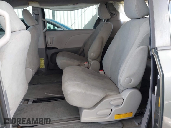 2014 Toyota Sienna L with VIN 5TDZK3DC6ES441417, listed as a IAAI auction lot 41950033 with 170,804 mi miles. Bid and sale history available at carsss.com. Image 8.
