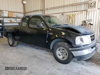 1998 Ford F-150 XL with VIN 1FTZX0725WKB83760, listed as a Copart auction lot 60988225 with 243,361 mi miles and Salvage title. Bid and sale history available at DreamBid. Image 4.
