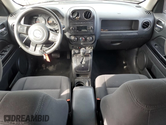 2012 Jeep Patriot Sport with VIN 1C4NJPBBXCD511285, listed as a Copart auction lot 49825915 with 197,269 mi miles and Salvage Title. Bid and sale history available at DreamBid. Image 8.