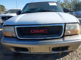1999 GMC Jimmy SLE with VIN 1GKDT13W9X2545745, listed as a IAAI auction lot 40566227 with 1 mi miles. Bid and sale history available at carsss.com. Image 6.