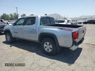 2019 Toyota Tacoma SR with VIN 3TMCZ5AN2KM277551, listed as a Copart auction lot 61586585 with 59,670 mi miles and Salvage title. Bid and sale history available at DreamBid. Image 2.