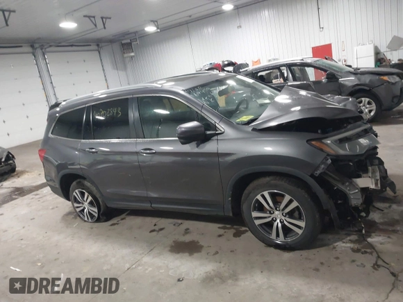 2017 Honda Pilot EX-L with VIN 5FNYF6H51HB080796, listed as a IAAI auction lot 40702843 with Not Provided miles and . Bid and sale history available at DreamBid. Image 12.