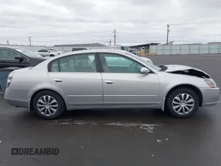 2006 Nissan Altima S with VIN 1N4AL11D46N392467, listed as a IAAI auction lot 41605074 with 96,987 mi miles and . Bid and sale history available at DreamBid. Image 13.