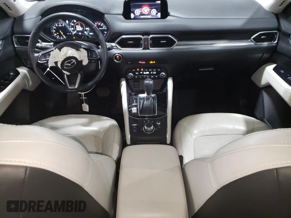 2020 Mazda CX-5 Grand Touring with VIN JM3KFBDM5L1851734, listed as a Copart auction lot 56729585 with 39,023 mi miles and Salvage title. Bid and sale history available at DreamBid. Image 8.