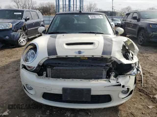 2010 MINI Convertible S with VIN WMWMS3C51ATZ85166, listed as a Copart auction lot 52907775 with 90,090 mi miles and Salvage title. Bid and sale history available at DreamBid. Image 5.
