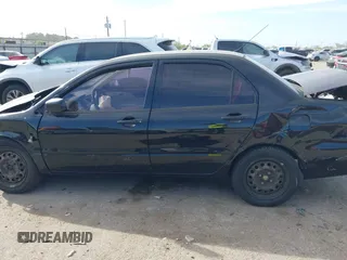 2006 Mitsubishi Lancer ES with VIN JA3AJ26EX6U059654, listed as a IAAI auction lot 41817577 with 180,177 mi miles. Bid and sale history available at carsss.com. Image 14.