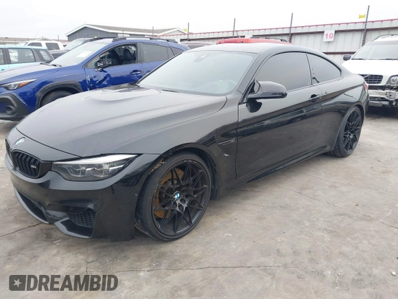 2019 BMW M4 with VIN WBS4Y9C53KAH82910, listed as a IAAI auction lot 41570315 with 59,227 mi miles. Bid and sale history available at carsss.com. Image 2.