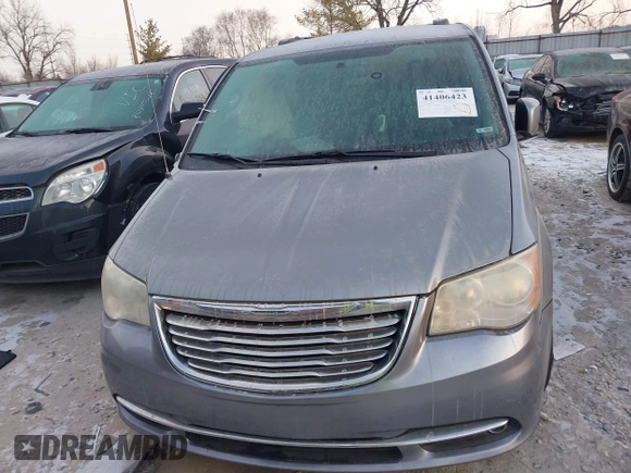 2014 Chrysler Town & Country Touring z VIN 2C4RC1BG2ER131605, wystawiony jako IAAI lot #41406423 z przebiegiem 167 567 mil mil oraz . Historia ofert i sprzedaży dostępna na DreamBid. Obrazek 12.