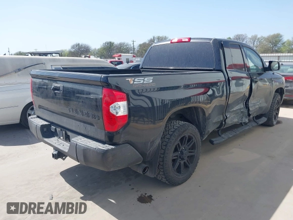 2019 Toyota Tundra SR with VIN 5TFRM5F16KX140346, listed as a IAAI auction lot 41830638 with 86,824 mi miles and . Bid and sale history available at DreamBid. Image 4.