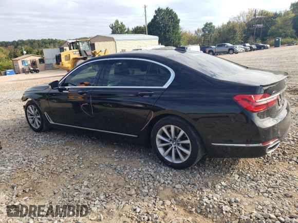 2018 BMW 7 Series 740i xDrive with VIN WBA7E4C5XJGV24003, listed as a Copart auction lot 71395443 with 63,558 mi miles. Bid and sale history available at carsss.com. Image 2.