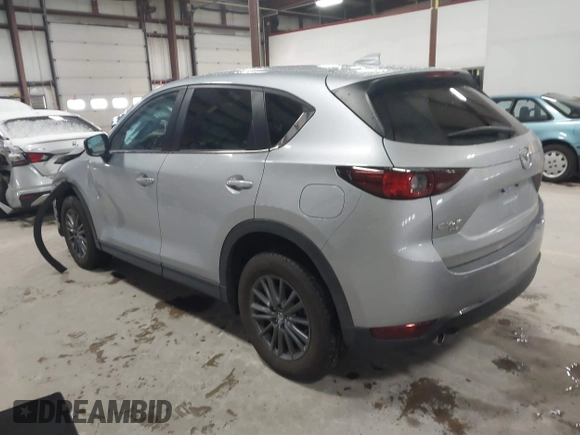 2020 Mazda CX-5 Touring with VIN JM3KFBCMXL0784653, listed as a IAAI auction lot 41817904 with 71,513 mi miles and . Bid and sale history available at carsss.com. Image 3.