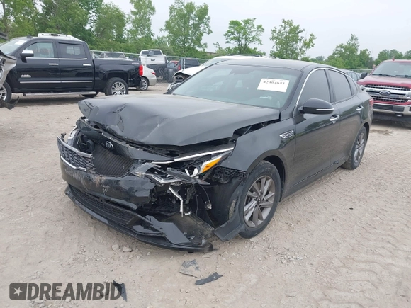 2020 Kia Optima LX with VIN 5XXGT4L37LG445597, listed as a IAAI auction lot 42404651 with 56,851 mi miles and . Bid and sale history available at DreamBid. Image 17.