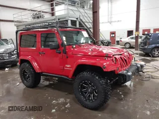 2011 Jeep Wrangler Sahara with VIN 1J4AA5D10BL593534, listed as a IAAI auction lot 41551416 with 101,716 mi miles and . Bid and sale history available at carsss.com. Image 1.