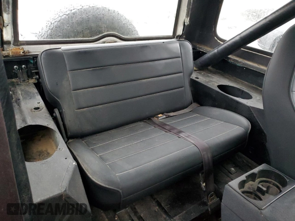 1985 Jeep CJ z VIN 1JCCM87AXFT128119, wystawiony jako Copart lot #42979045 z przebiegiem 83 932 mil mil oraz Tytuł czysty. Historia ofert i sprzedaży dostępna na DreamBid. Obrazek 11.