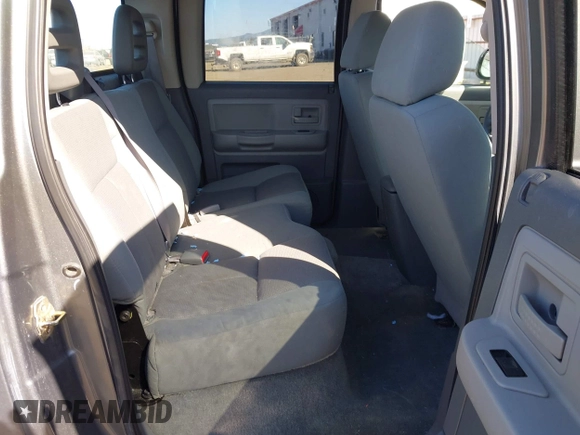 2005 Dodge Dakota SLT with VIN 1D7HW48N25S133725, listed as a IAAI auction lot 42074588 with 163,090 mi miles. Bid and sale history available at carsss.com. Image 8.