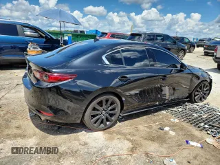 2022 Mazda 3 2.5 Turbo z VIN 3MZBPBAY9NM305244, wystawiony jako Copart lot #63661025 z przebiegiem 89 066 mil mil oraz Czysty tytuł • Clean title. Historia ofert i sprzedaży dostępna na DreamBid. Obrazek 3.