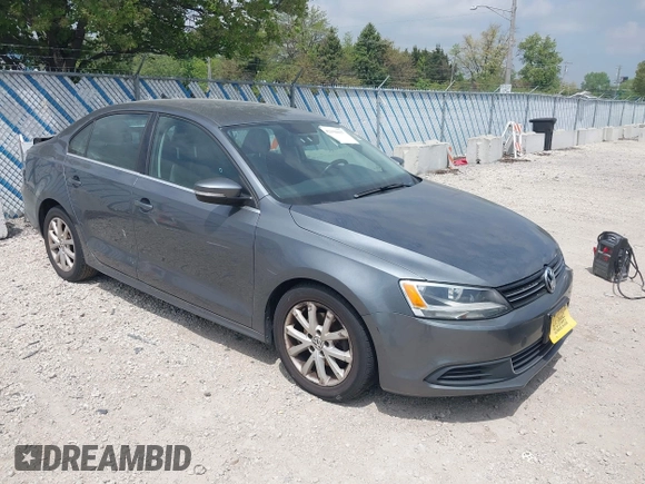 2013 Volkswagen Jetta SE with VIN 3VWDX7AJXDM255977, listed as a IAAI auction lot 42194447 with 120,921 mi miles and . Bid and sale history available at DreamBid. Image 1.