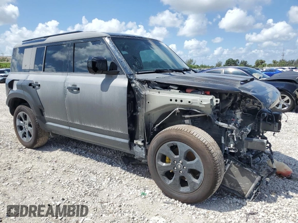 2023 Land Rover Defender S with VIN SALEJ7EX4P2241794, listed as a Copart auction lot 49135075 with 12,641 mi miles and Salvage title. Bid and sale history available at DreamBid. Image 4.