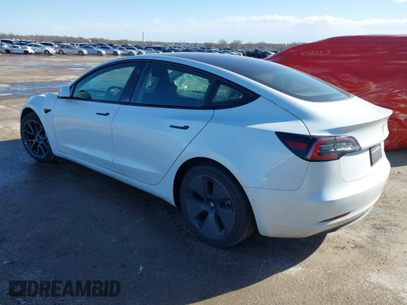 2021 Tesla Model 3 Long Range with VIN 5YJ3E1EB0MF992792, listed as a IAAI auction lot 41726740 with 33,507 mi miles. Bid and sale history available at carsss.com. Image 3.