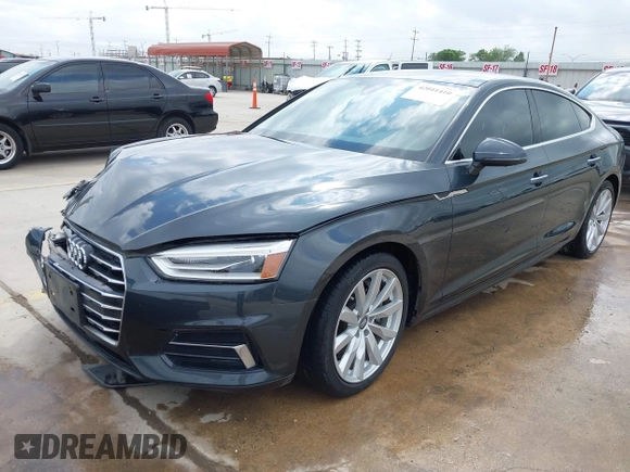 2018 Audi A5 Sportback Premium z VIN WAUANCF5XJA022221, wystawiony jako IAAI lot #42041410 z przebiegiem 94 851 mil mil oraz . Historia ofert i sprzedaży dostępna na DreamBid. Obrazek 2.
