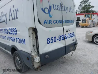 2015 Ford Transit Cargo Van with VIN 1FTNR2CM5FKA90345, listed as a IAAI auction lot 41533072 with 158,309 mi miles. Bid and sale history available at carsss.com. Image 6.