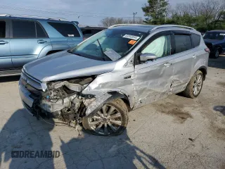 2017 Ford Escape Titanium with VIN 1FMCU9J95HUA48080, listed as a Copart auction lot 83202034 with 122,528 mi miles and Salvage Title. Bid and sale history available at carsss.com. Image 1.