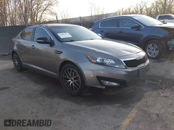 2013 Kia Optima LX with VIN 5XXGM4A77DG166140, listed as a IAAI auction lot 41881144 with 185,391 mi miles. Bid and sale history available at carsss.com. Image 1.