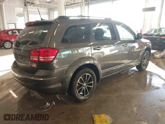 2018 Dodge Journey SE with VIN 3C4PDCAB1JT519745, listed as a IAAI auction lot 41366307 with 131,436 mi miles. Bid and sale history available at carsss.com. Image 4.