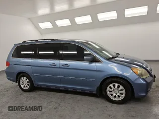 2009 Honda Odyssey EX-L with VIN 5FNRL38699B037510, listed as a Copart auction lot 49621365 with 101,995 mi miles and Clean Title. Bid and sale history available at DreamBid. Image 4.