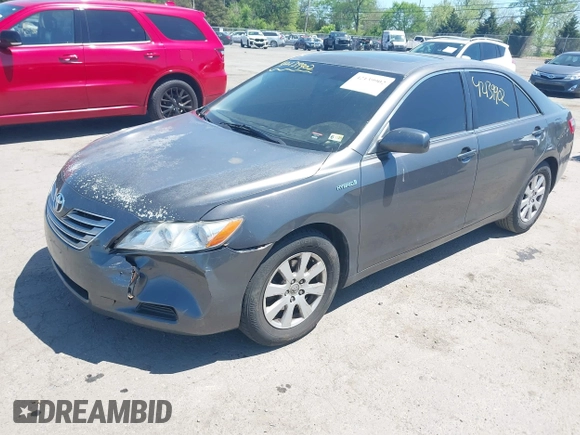 2007 Toyota Camry z VIN JTNBB46K573005122, wystawiony jako IAAI lot #42139902 z przebiegiem 251 304 mil mil oraz . Historia ofert i sprzedaży dostępna na DreamBid. Obrazek 2.