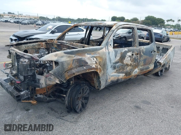 2023 Toyota Tacoma SR5 z VIN 3TMAZ5CN8PM213333, wystawiony jako IAAI lot #41475450 z przebiegiem Nie podano mil oraz . Historia ofert i sprzedaży dostępna na DreamBid. Obrazek 2.