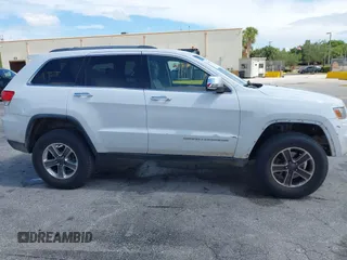 2014 Jeep Grand Cherokee Limited with VIN 1C4RJFBG5EC132159, listed as a IAAI auction lot 42604916 with 248,954 mi miles and . Bid and sale history available at DreamBid. Image 6.