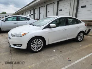 2018 Ford Focus Titanium z VIN 1FADP3J26JL252971, wystawiony jako Copart lot #59780375 z przebiegiem 74 006 mil mil oraz Szkoda całkowita • Salvage title. Historia ofert i sprzedaży dostępna na DreamBid. Obrazek 1.