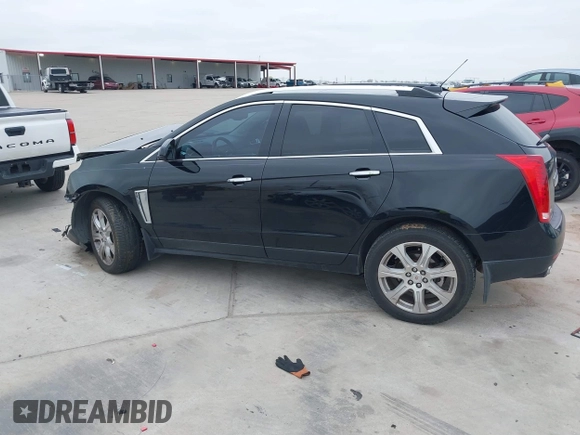 2015 Cadillac SRX Premium Collection z VIN 3GYFNDE3XFS576695, wystawiony jako IAAI lot #41612836 z przebiegiem Nie podano mil oraz . Historia ofert i sprzedaży dostępna na DreamBid. Obrazek 14.