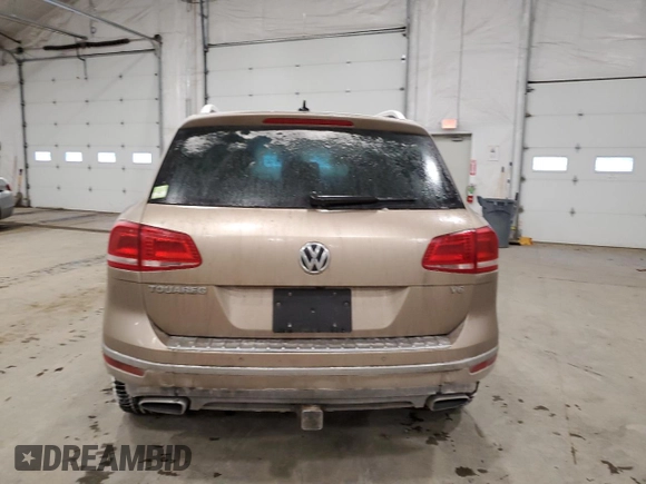 2016 Volkswagen Touareg Sport with VIN WVGEF9BP3GD010197, listed as a Copart auction lot 85826584 with 106,375 mi miles and Salvage Title. Bid and sale history available at DreamBid. Image 6.