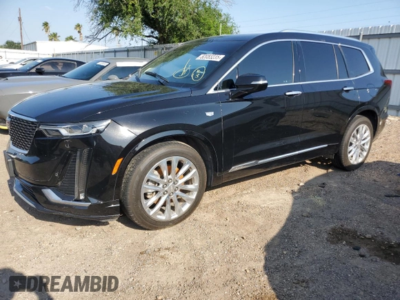 2020 Cadillac XT6 FWD Premium Luxury с VIN 1GYKPCRSXLZ174002, выставлен на аукционе Copart как лот 52083235 с пробегом 79 712 миль миль и Списание • Salvage title. История ставок и продаж доступна на DreamBid. Изображение 1.