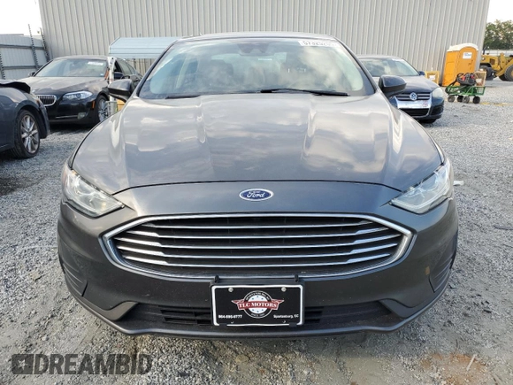 2020 Ford Fusion SE with VIN 3FA6P0HD0LR184251, listed as a Copart auction lot 57325205 with 99,142 mi miles and Salvage title. Bid and sale history available at DreamBid. Image 5.