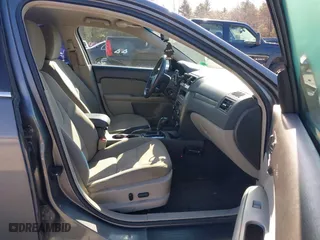 2011 Ford Fusion Hybrid with VIN 3FADP0L36BR114063, listed as a IAAI auction lot 42013961 with 141,255 mi miles. Bid and sale history available at carsss.com. Image 5.