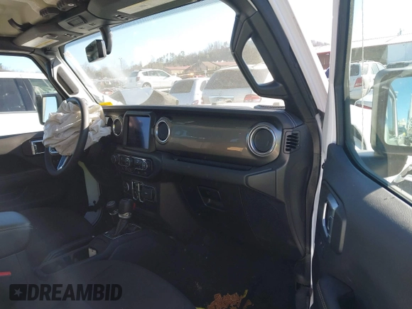 2023 Jeep Gladiator High Altitude with VIN 1C6HJTFG4PL560982, listed as a IAAI auction lot 41236477 with 28,835 mi miles and . Bid and sale history available at DreamBid. Image 5.