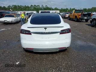 2014 Tesla Model S 60 with VIN 5YJSA1H1XEFP40611, listed as a IAAI auction lot 42826752 with Not provided miles and . Bid and sale history available at DreamBid. Image 15.