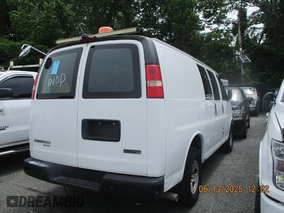 2011 Chevrolet Express Cargo with VIN 1GCWGFCB7B1123426, listed as a IAAI auction lot 42573299 with Not provided miles and . Bid and sale history available at DreamBid. Image 10.
