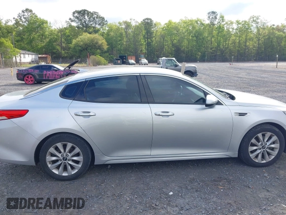 2018 Kia Optima EX with VIN 5XXGU4L34JG237557, listed as a IAAI auction lot 42000008 with 128,694 mi miles and . Bid and sale history available at carsss.com. Image 13.