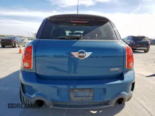2012 MINI Countryman S with VIN WMWZC3C5XCWM27675, listed as a Copart auction lot 49676205 with 111,499 mi miles and Salvage title. Bid and sale history available at DreamBid. Image 6.