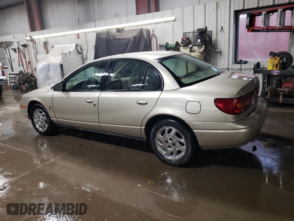 2000 Saturn SL with VIN 1G8ZK5278YZ269342, listed as a Copart auction lot 82573694 with 53,641 mi miles and Salvage title. Bid and sale history available at DreamBid. Image 2.