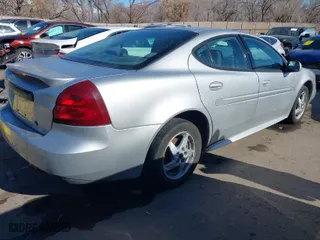 2004 Pontiac Grand Prix GT1 with VIN 2G2WP522741314535, listed as a IAAI auction lot 41398760 with 210,183 mi miles. Bid and sale history available at carsss.com. Image 4.