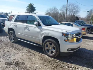 2020 Chevrolet Tahoe LT with VIN 1GNSCBKCXLR289172, listed as a IAAI auction lot 41441514 with 57,993 mi miles and . Bid and sale history available at DreamBid. Image 1.